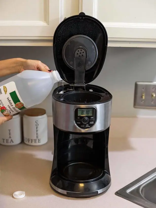 Cleaning coffee pot with vinegar